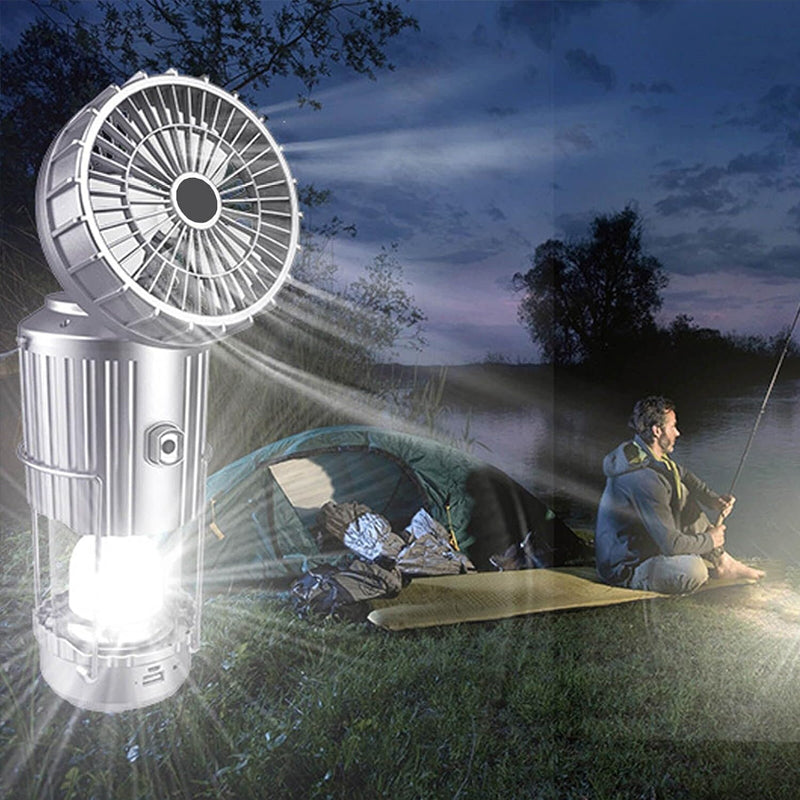 Kannettava 6-in-1 aurinkokäyttöinen LED-retkilamppu, kultainen sävy, monitoimirakenne valaistuksella ja tuulettimella.