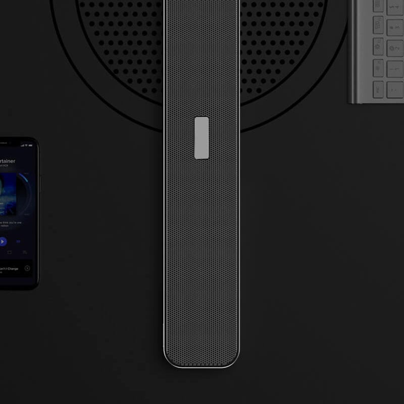 Kompakt grå bærbar Bluetooth 5.0 højttaler til moderne smart home, tilbyder HD-lyd og 10-12 timers batterilevetid.