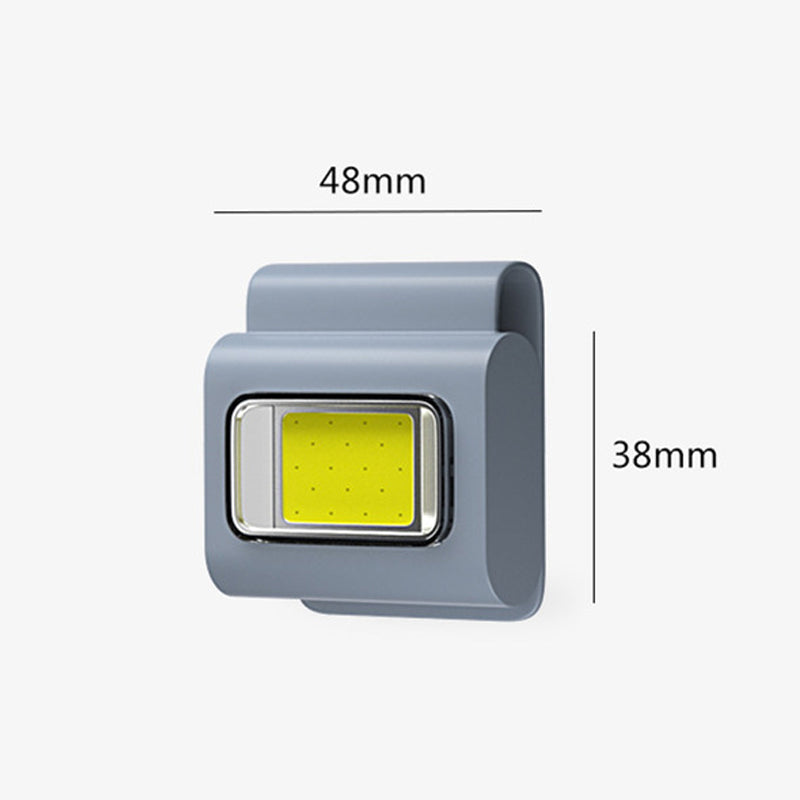 Kompakt grå bærbar LED-lommelygte, magnetisk beslag, flere lysindstillinger, USB-genopladelig, IPX4 vandtæt.