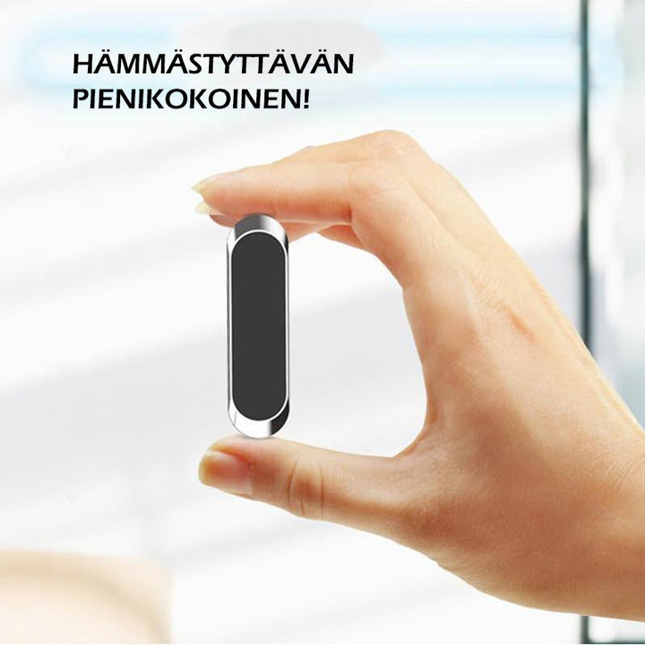 Kompakt og stilfuld magnetisk biltelefonholder, sort silikoneoverflade og stærke magneter sikrer stabilitet.