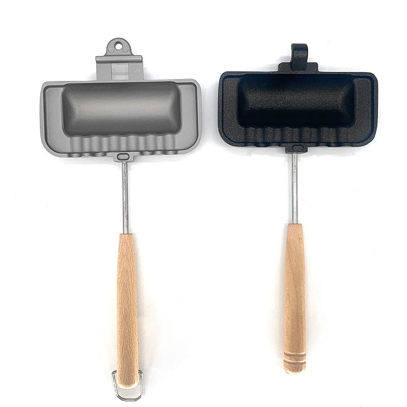 Kompakt dobbelsidet sandwich-bageform i aluminium, sort non-stick belægning, ideel til små køkkener.