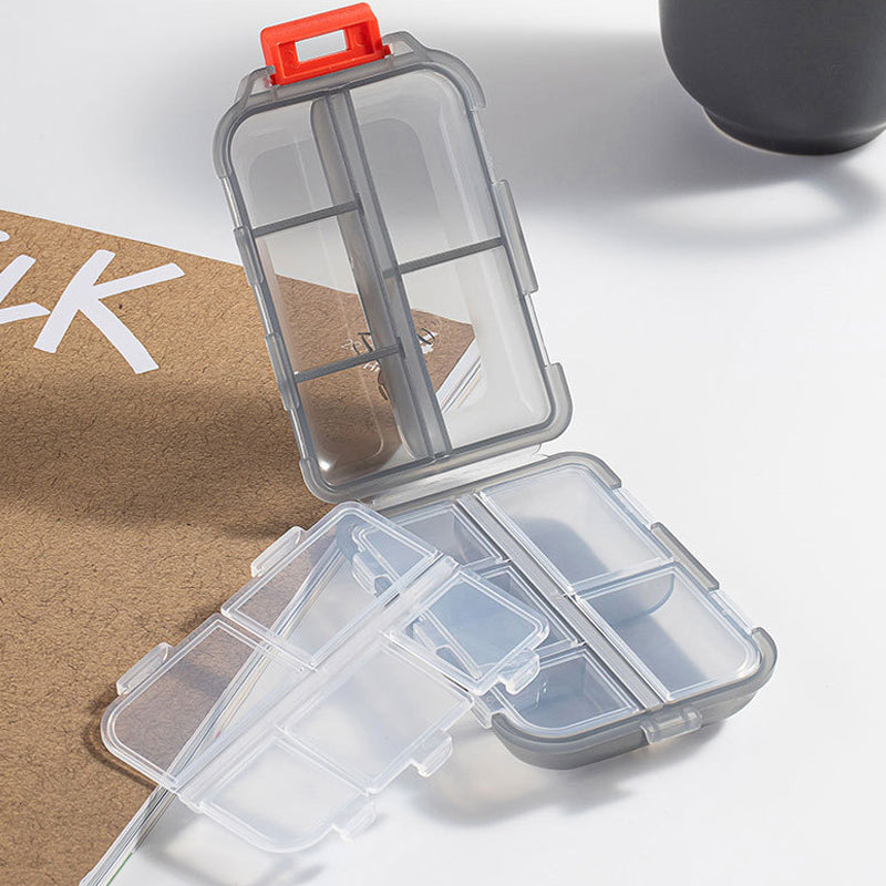 Kompakt bærbar pilleæske, 10 rum, multifarvede etiketter, plastik, gør det nemt at organisere medicin.