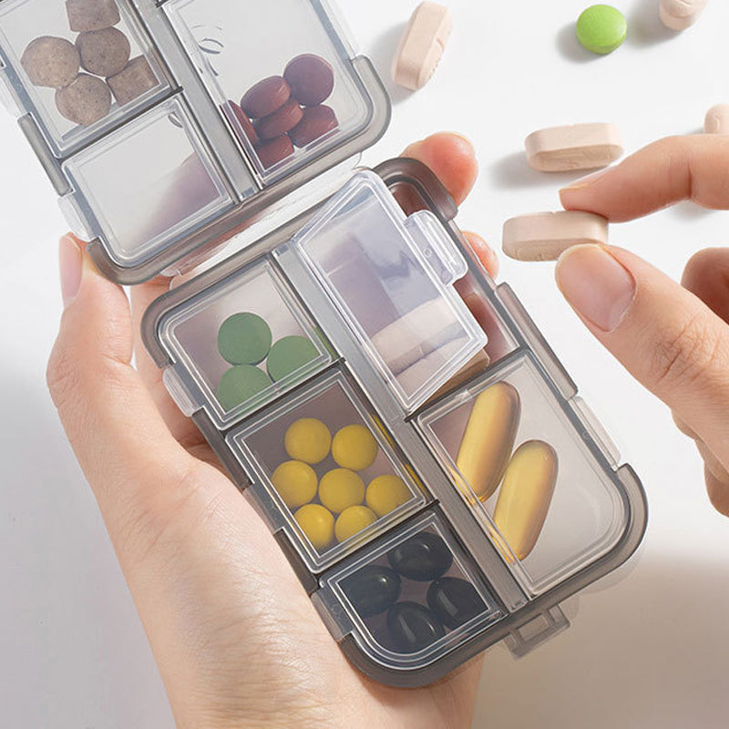 Kompakt bærbar pilleæske, 10 rum, multifarvede etiketter, plastik, gør det nemt at organisere medicin.
