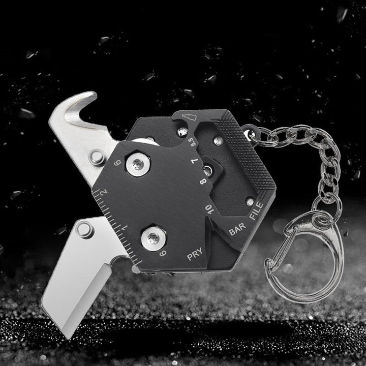 Kompakt multifunktionelt nøgleringsværktøj, metallisk og stilfuldt, inkluderer flaskeåbner, forbedrer hverdagens bekvemmelighed.