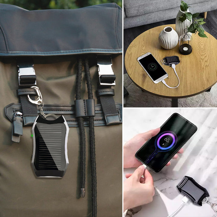 Kompakt hvid og sort mini powerbank nøglering, stilfuldt telefontilbehør, lommevenlig kraftfuld oplader.