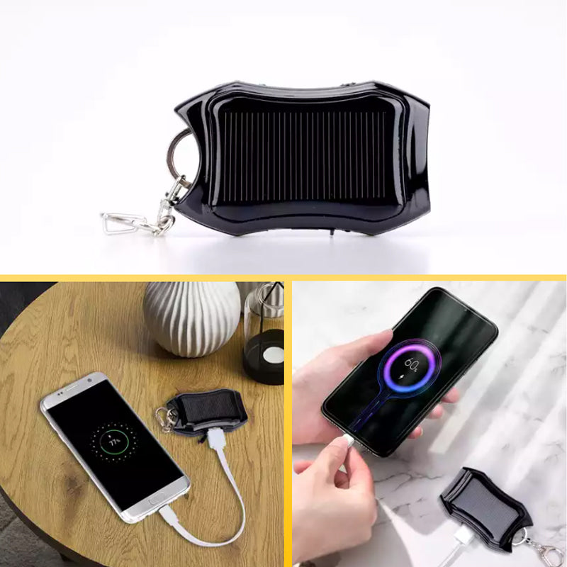 Kompakt hvid og sort mini powerbank nøglering, stilfuldt telefontilbehør, lommevenlig kraftfuld oplader.