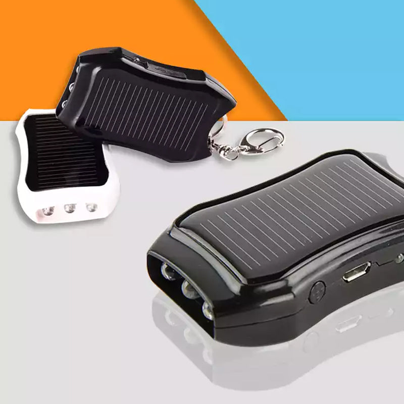 Kompakt hvid og sort mini powerbank nøglering, stilfuldt telefontilbehør, lommevenlig kraftfuld oplader.