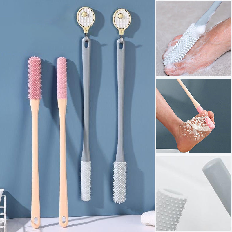 Kompakt tåspalte rensebørste, ergonomisk håndtag, bløde børster, ideel til fodhygiejne.