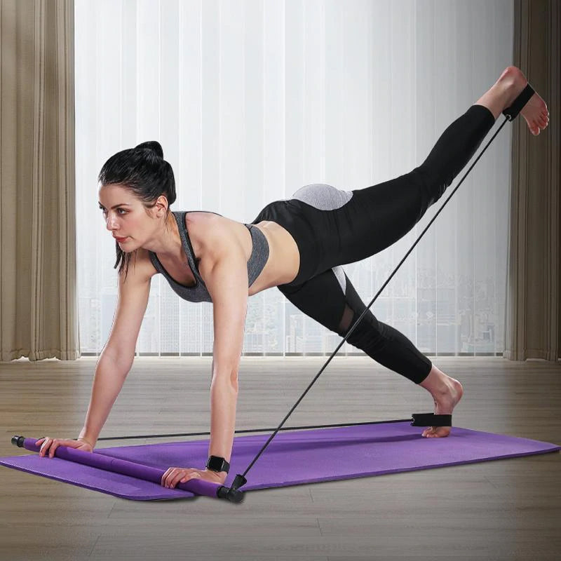 Kompakt violet bærbart Pilates-stangssæt med modstandsbånd, ideelt til alsidig kropstræning og nem transport.