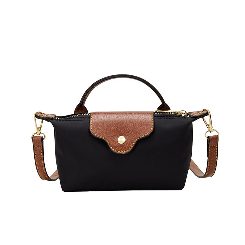 Kompakt farveblok crossbody-taske til damer i nuancer af blå, sort og khaki; en praktisk og stilfuld accessory.