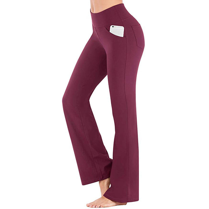 Damehøjbuksede sorte bootcut yogabukser, blødt og åndbart materiale, behagelig pasform til træning.