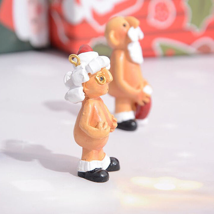 Sjovt håndmalet juletræspynt med børnetema, farverigt og muntert udtryk, kompakt 5 cm størrelse, harpiks materiale.