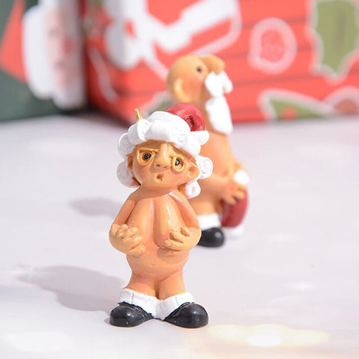 Sjovt håndmalet juletræspynt med børnetema, farverigt og muntert udtryk, kompakt 5 cm størrelse, harpiks materiale.