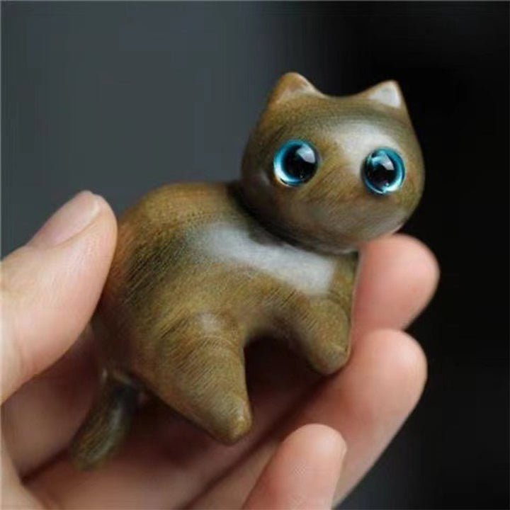 Håndlavede figurer af trækatte, skåret i sandeltræ, nuttede og kunstneriske. Perfekt gave til en katteelsker.