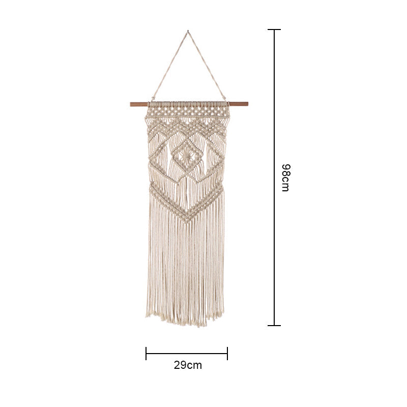 Håndlavet boheme vægtæppe i bomuld, detaljeret frynse og geometrisk design, naturhvid farve.