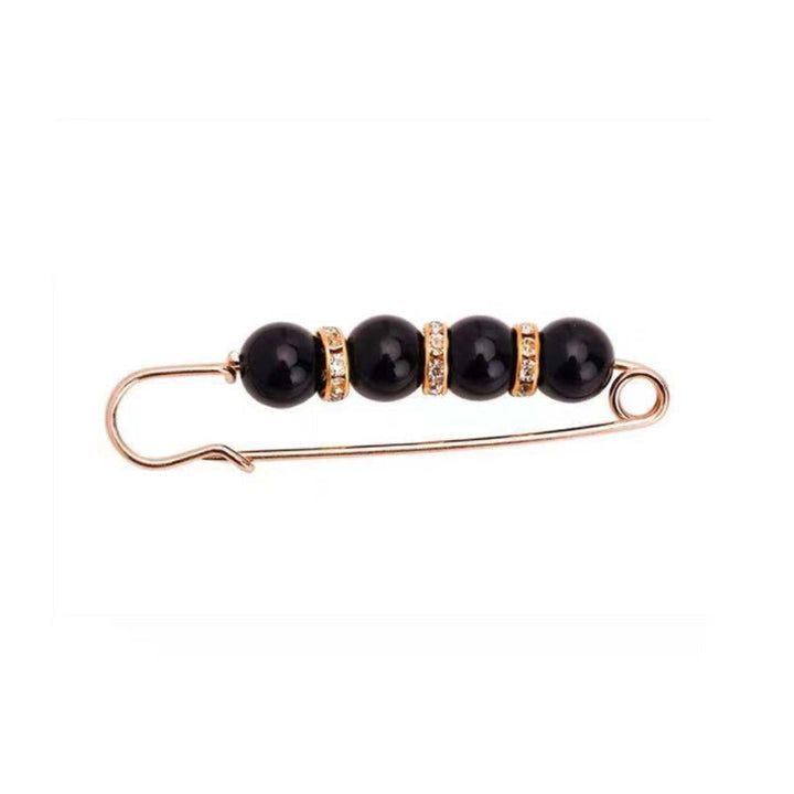 Dame guld broche med hvide rhinsten og perler, 5,6 x 1,3 cm. Elegant mode og alsidighed.