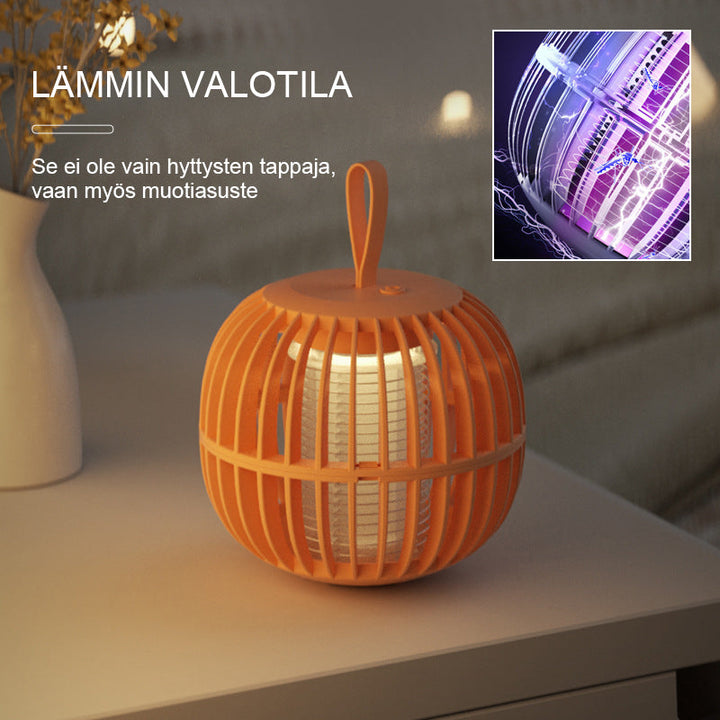 "Kurpitsan muotoinen äänetön 2 in 1 hyönteisloukkuvalo violeteilla LED-valoilla ja USB-latauksella."