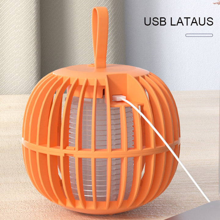"Kurpitsan muotoinen äänetön 2 in 1 hyönteisloukkuvalo violeteilla LED-valoilla ja USB-latauksella."