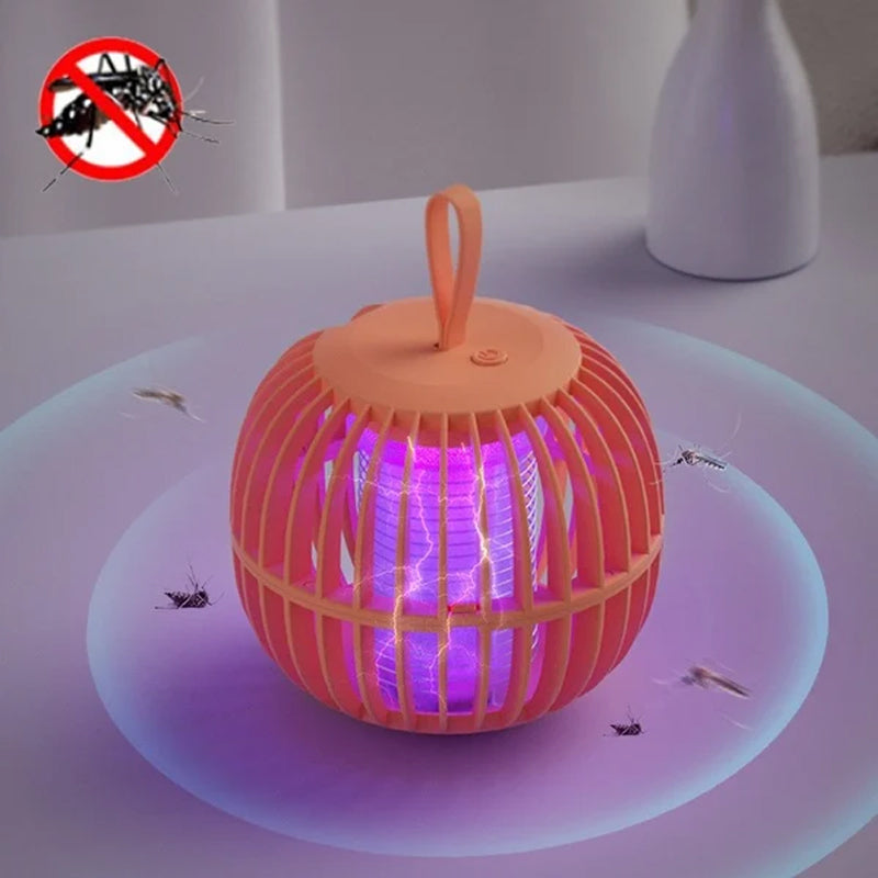 "Kurpitsan muotoinen äänetön 2 in 1 hyönteisloukkuvalo violeteilla LED-valoilla ja USB-latauksella."