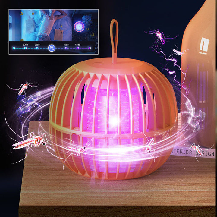 "Kurpitsan muotoinen äänetön 2 in 1 hyönteisloukkuvalo violeteilla LED-valoilla ja USB-latauksella."