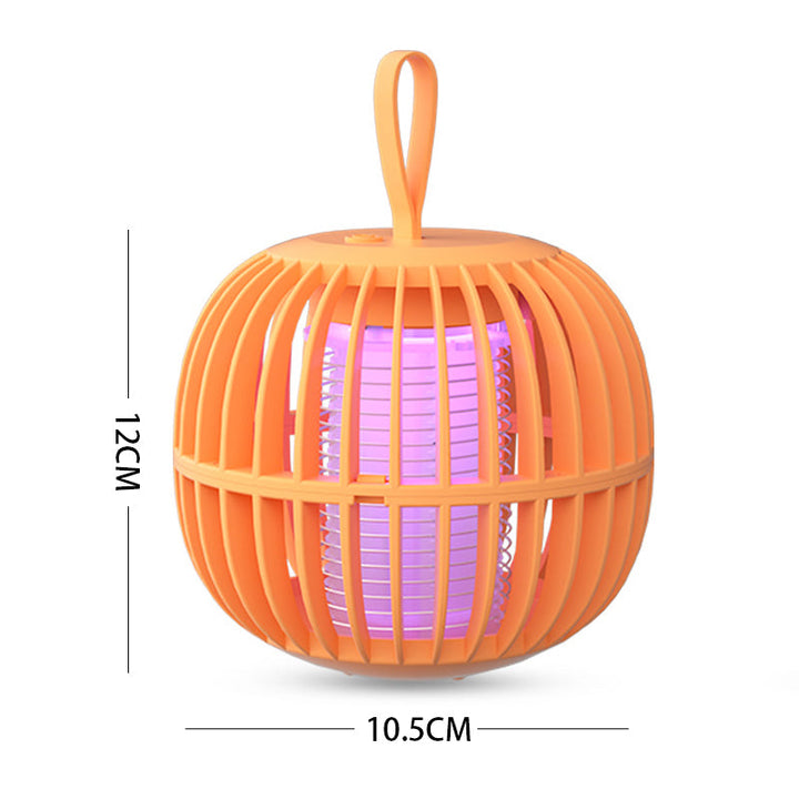 "Kurpitsan muotoinen äänetön 2 in 1 hyönteisloukkuvalo violeteilla LED-valoilla ja USB-latauksella."