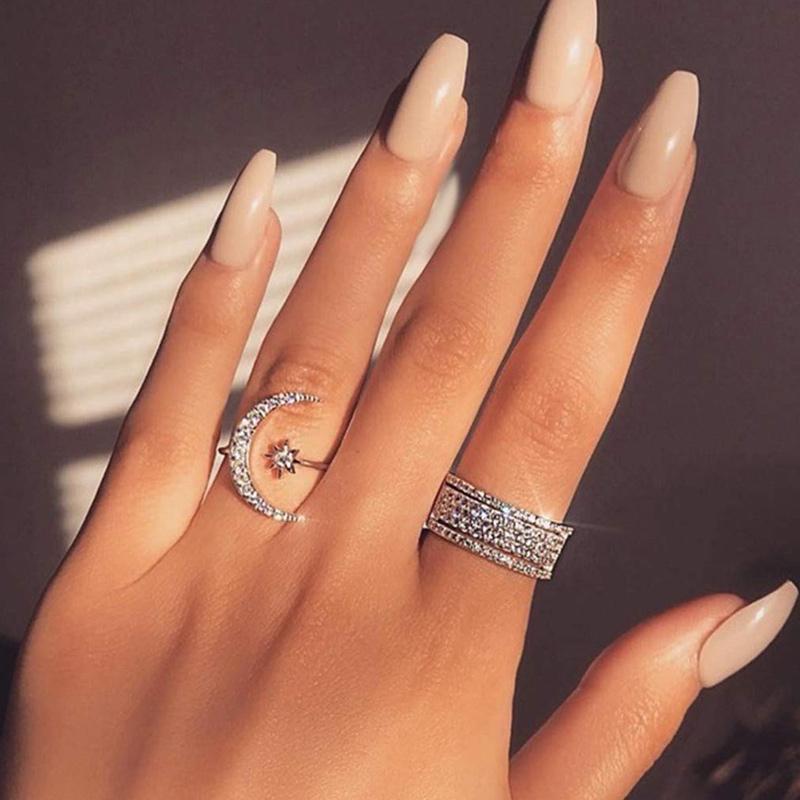 Kvinders Måne & Stjerne ring, halvmåne design med zirkonia dekorationer, tilgængelig i sølv, guld, rosaguld.