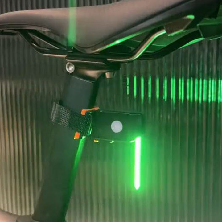 LED cykellygte til cykelbagende, rund og kompakt, sort kabinet med 40 lumen lysstyrke, perfekt til sikker cykling.