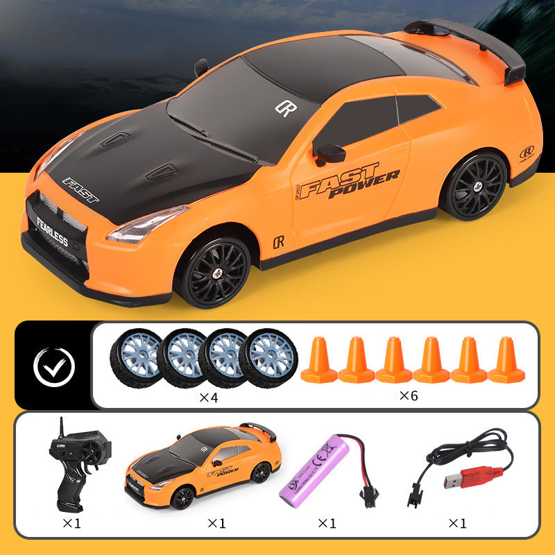 "Ladattava RC-drift-auto, neliveto, LED-valot, tyylikäs muotoilu, tehokas moottori, kääntymistä parantavat kilparenkaat."