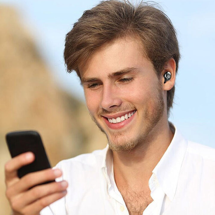 Trådløse Bluetooth-hovedtelefoner til sport, sort/hvid, trådløse, minimalistisk design, IPX8 vandtætte.