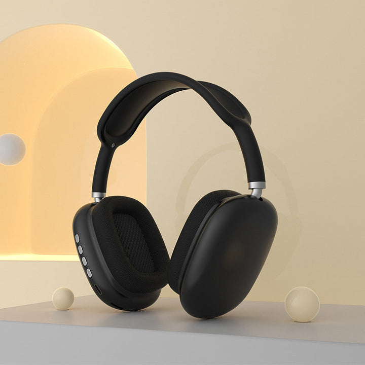 Trådløse komfortable over-ear Bluetooth-hovedtelefoner, stilfuldt sort design, bløde ørepuder, kraftfuld lydgengivelse.