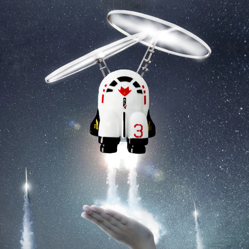Børns flyvende astronautlegetøj med gyroskop, holdbart hvidt PP-plast, rumtema, oplyst i mørket.