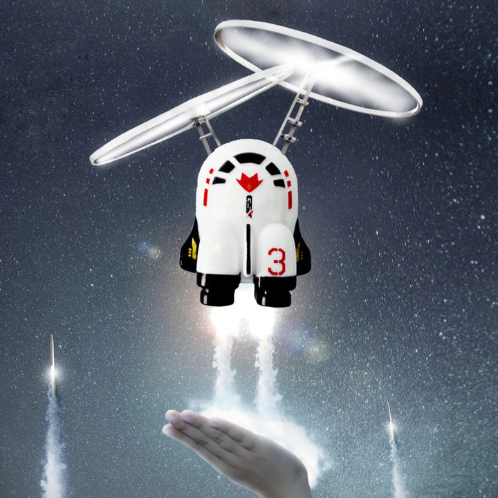 Børns flyvende astronautlegetøj med gyroskop, holdbart hvidt PP-plast, rumtema, oplyst i mørket.