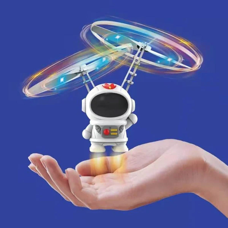 Børns flyvende astronautlegetøj med gyroskop, holdbart hvidt PP-plast, rumtema, oplyst i mørket.