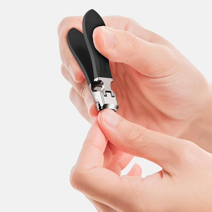 Bredmundet, stænkfri negleklipper, ergonomisk design, sort eller orange, buet klinge, rustfrit stål.