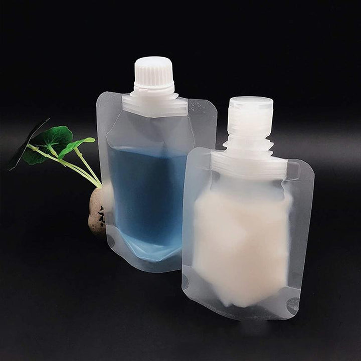Gennemsigtig 100 ml pose til kosmetik, tæt skruelåg, genopfyldelig, praktisk design.