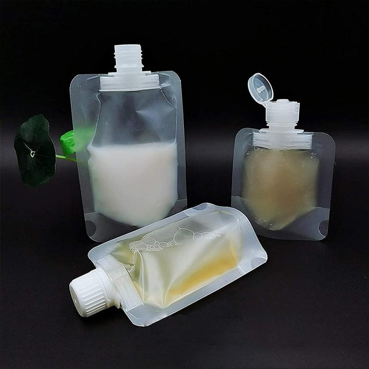 Gennemsigtig 100 ml pose til kosmetik, tæt skruelåg, genopfyldelig, praktisk design.