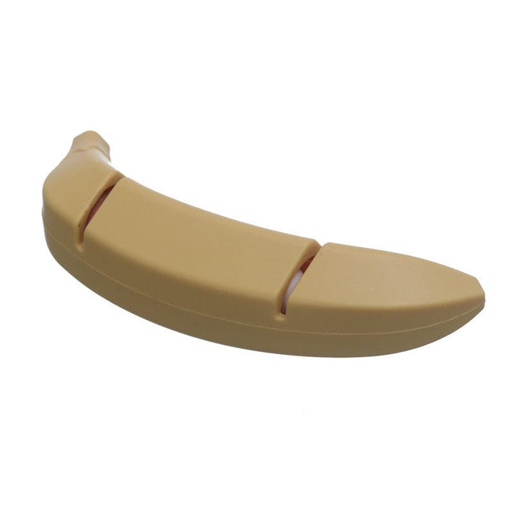 Kreativ knivsliber med banan-design, gul farve, kompakt størrelse, et sjovt og praktisk tilbehør til køkkenet.