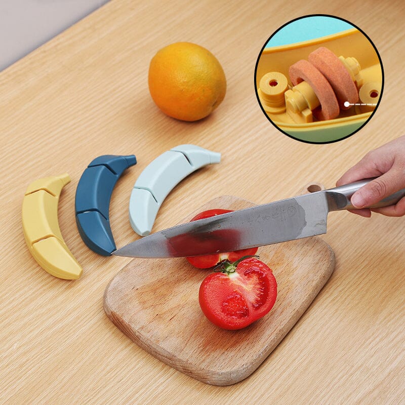 Kreativ knivsliber med banan-design, gul farve, kompakt størrelse, et sjovt og praktisk tilbehør til køkkenet.