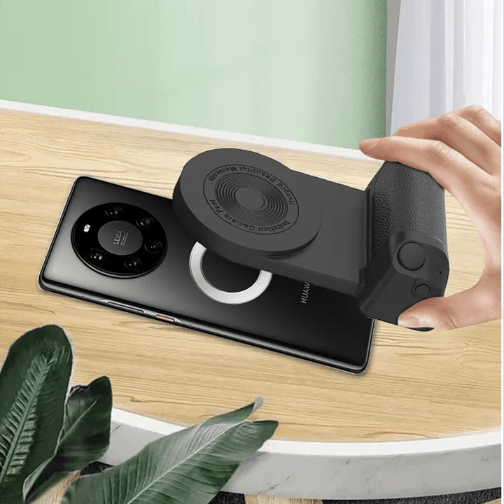 Magneettinen Bluetooth-kamerakahva puhelimille, ergonominen muotoilu, liukumaton pinta, musta väri, innovatiivinen kiinnitys.