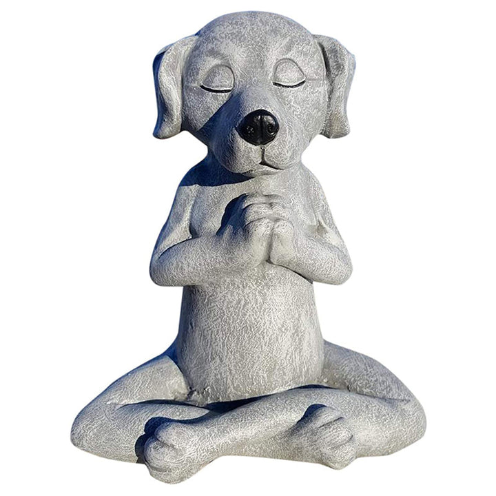 Meditativ hund harpiks havepynt, siddende med krydsede ben i en fredfyldt positur, velegnet til indendørs og udendørs brug.
