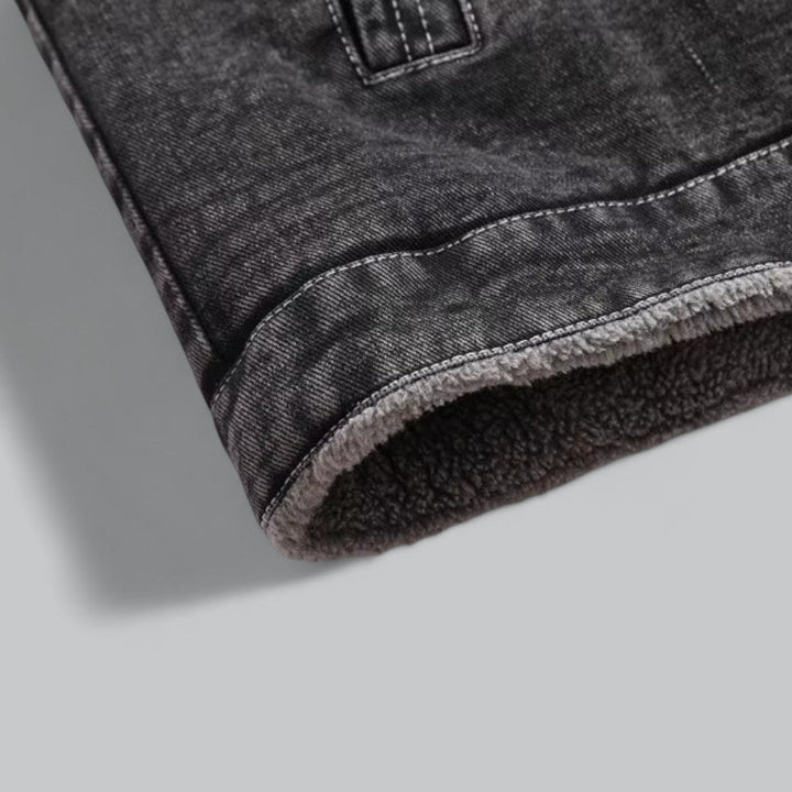 Mænds fleeceforede denimjakke til vinterbrug, stilfuld og varmeisolerende, sort, klassisk model.