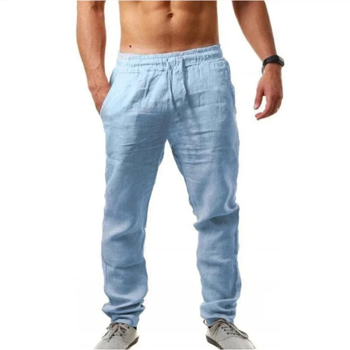 Miesten hengittävät slim-fit kuntohousut, harmaa väri, joustava vyötärö, sopii treeniin ja vapaa-aikaan.