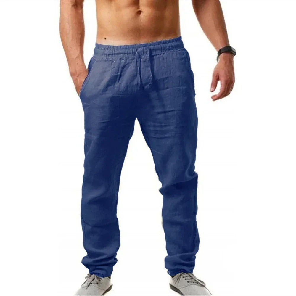 Miesten hengittävät slim-fit kuntohousut, harmaa väri, joustava vyötärö, sopii treeniin ja vapaa-aikaan.