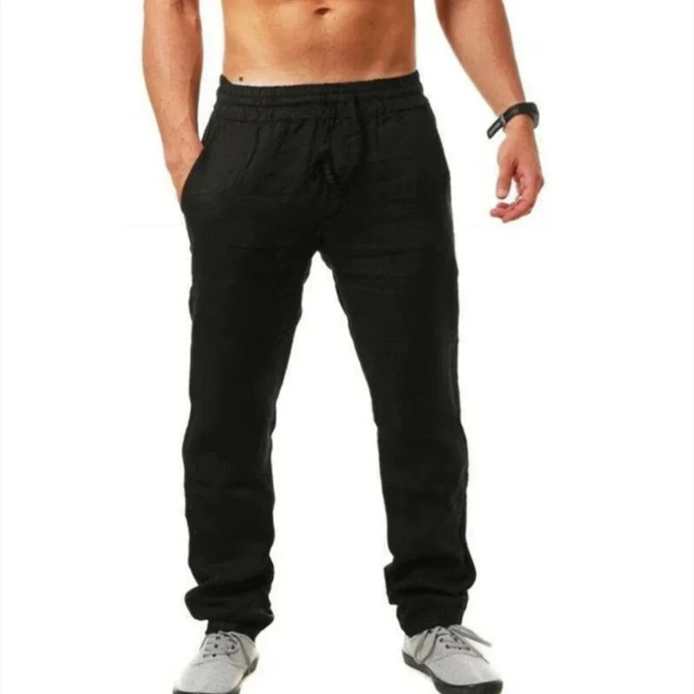 Miesten hengittävät slim-fit kuntohousut, harmaa väri, joustava vyötärö, sopii treeniin ja vapaa-aikaan.