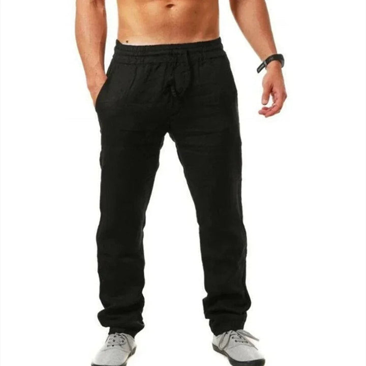 Miesten hengittävät slim-fit kuntohousut, harmaa väri, joustava vyötärö, sopii treeniin ja vapaa-aikaan.
