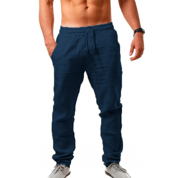 Miesten hengittävät slim-fit kuntohousut, harmaa väri, joustava vyötärö, sopii treeniin ja vapaa-aikaan.