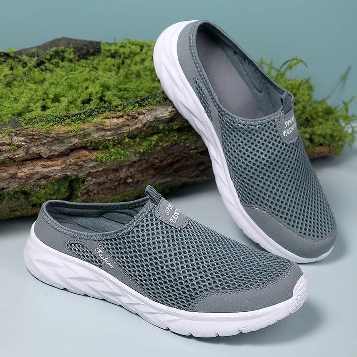 "Miesten hengittävät slip-on verkkojalkineet, kevyt rakenne, ilmava verkkopäällys, avoin takaosa, mukavat kesään."