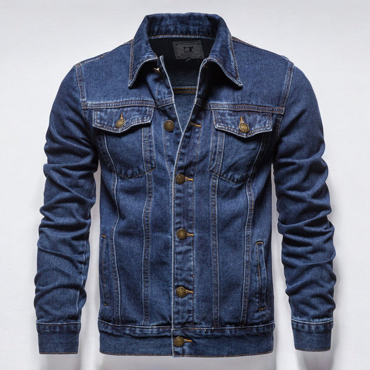 Miesten kestävä pesemätön denim takki edestä, jykevä sininen materiaali, rintataskut, sopii moderniin tyyliin.