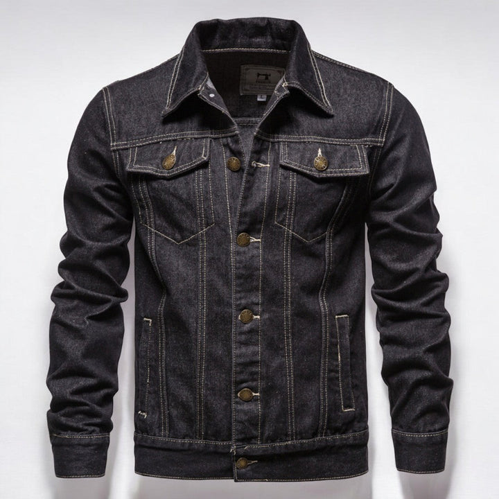 Miesten kestävä pesemätön denim takki edestä, jykevä sininen materiaali, rintataskut, sopii moderniin tyyliin.