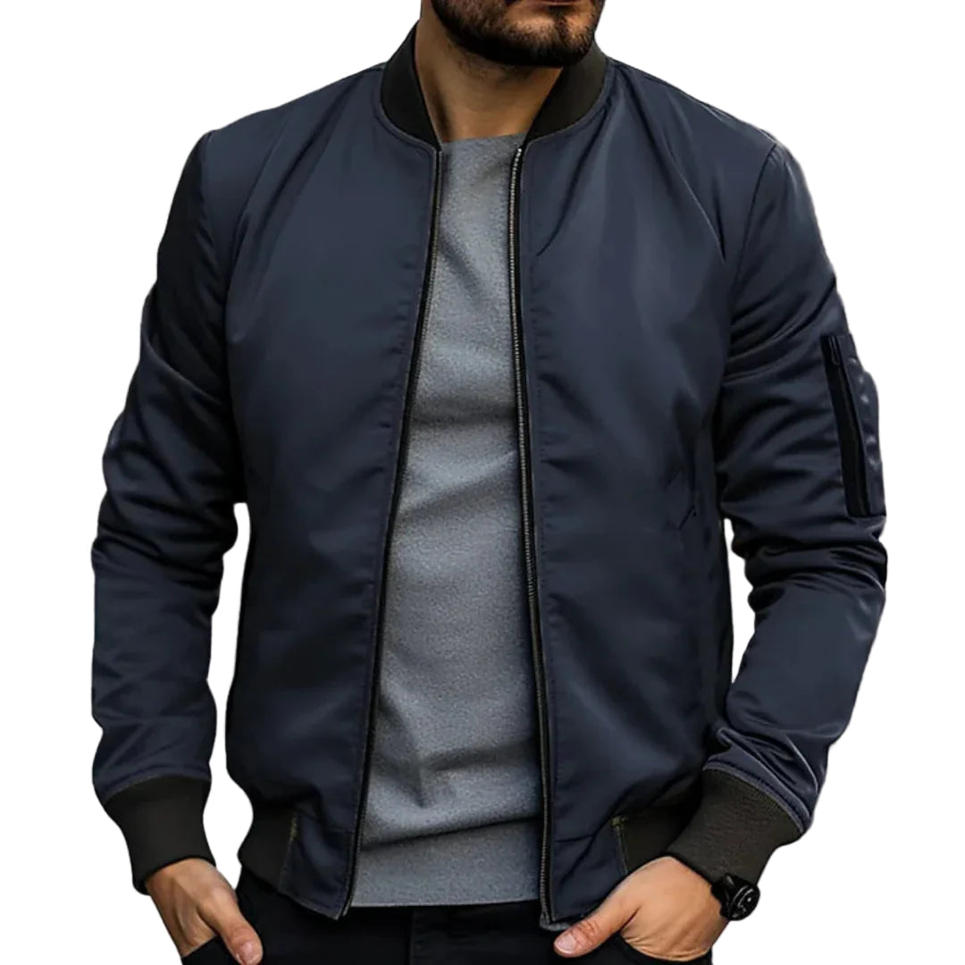 "Miesten kevyt tuulitakkityylinen bomber-takki, minimalistinen design, ribbaus hihansuissa, vetoketjullinen tasku"